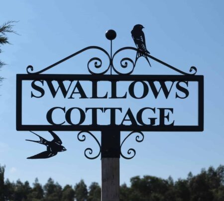 road entrance and road end sign scrolls and swallows