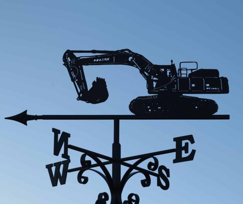 a digger shaped black weathervane handmade by blacksmiths in kent