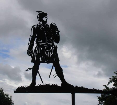 a black silhouette of a Highland Warrior Scottish Weathervane made by black forge art blacksmiths in kent