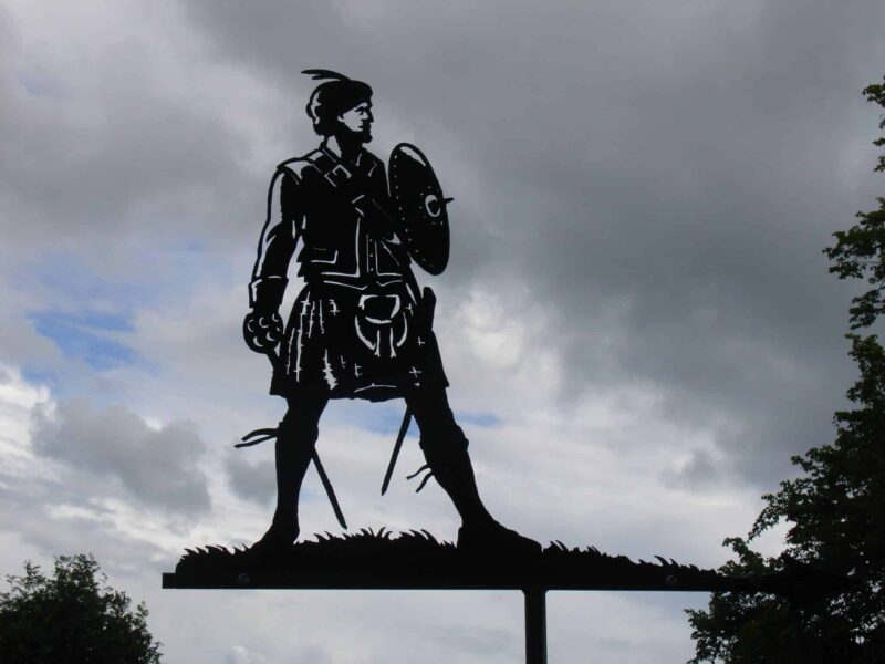 a black silhouette of a Highland Warrior Scottish Weathervane made by black forge art blacksmiths in kent