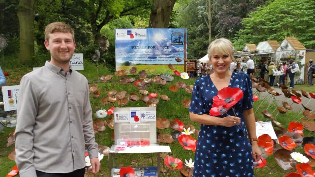 The Chelsea Flower Show - Josh and Nicki Chapman with an armful of our charity 'Steel Poppies'