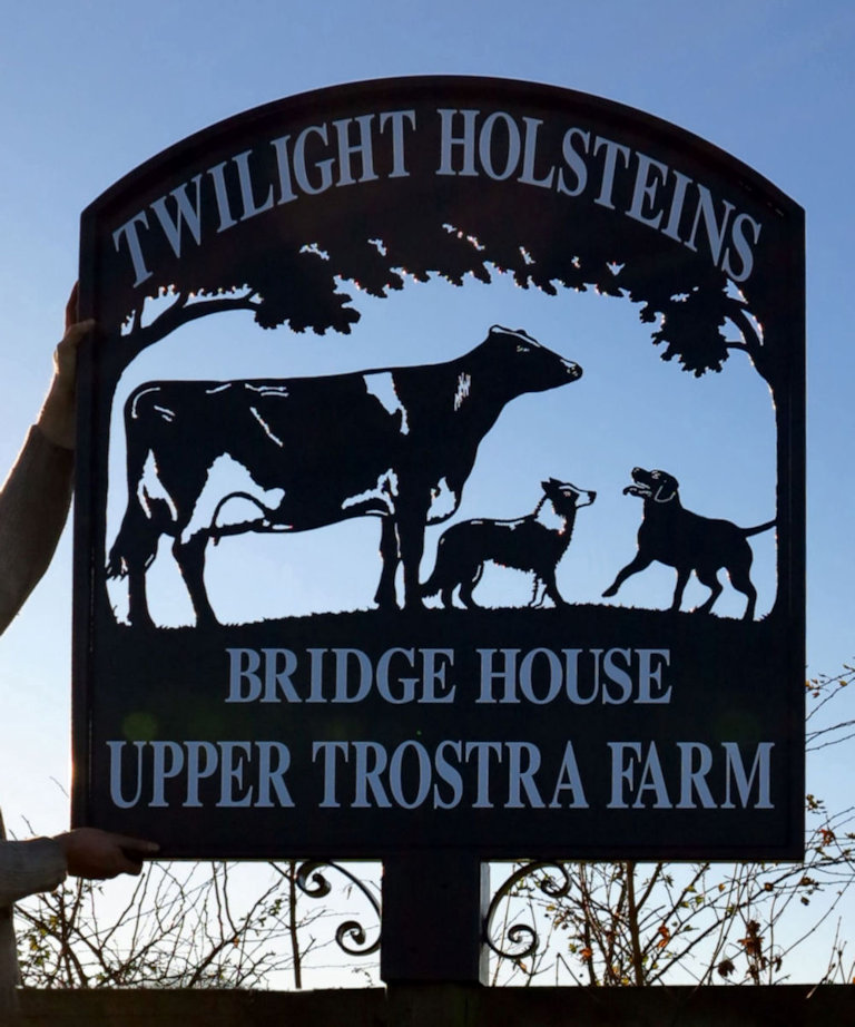 Cow and dogs arched top metal post sign