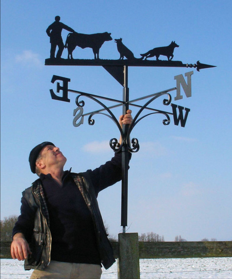 Farmer and bull with dogs weathervane